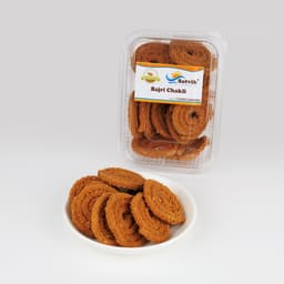 Bhajani Chakli 200 GMS prepared with roasted flours and traditional spices, hygienically packed for freshness and crunchy texture.