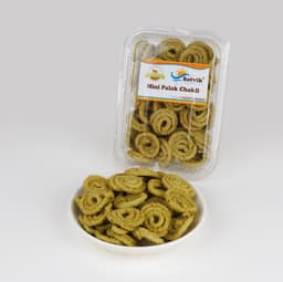 Mini Butter Chakli Palak 100 GMS made with premium ingredients and spinach flavor, hygienically packed for freshness and crunch.