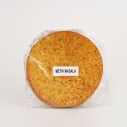 Machine Made Methi Masala Khakhra 500 GMS with crisp texture, fenugreek flavor and aromatic masala seasoning.