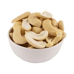 Premium split cashew kernels neatly placed in a bowl, featuring a smooth texture, creamy colour, and ideal quality for homemade recipes.