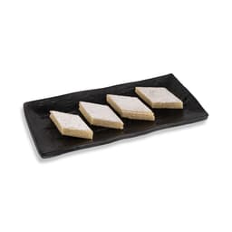 Kaju Katli White 250 GMS prepared with premium cashews and quality ingredients, hygienically packed for freshness and rich traditional sweetness.