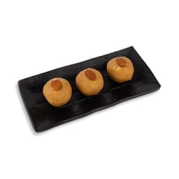 Besan Ladoo 500 GMS made with premium gram flour, pure ghee, and quality ingredients, hygienically packed for freshness and authentic traditional taste.