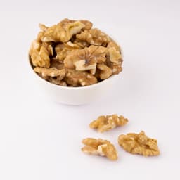 Akhrot (Tukda) 250 Gms displayed with premium walnut pieces, light golden colour, crisp texture, and natural freshness.