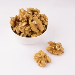 Akhrot (SP) 250 Gms displayed with premium walnut kernels, golden colour, crisp texture, and natural freshness.