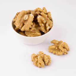 Akhrot (JUMBO) 250 Gms displayed with jumbo walnut kernels, rich natural colour, and crunchy texture.